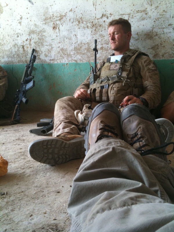 Another exhausted Marine. They can fall asleep within a minute of a battle ending, anywhere